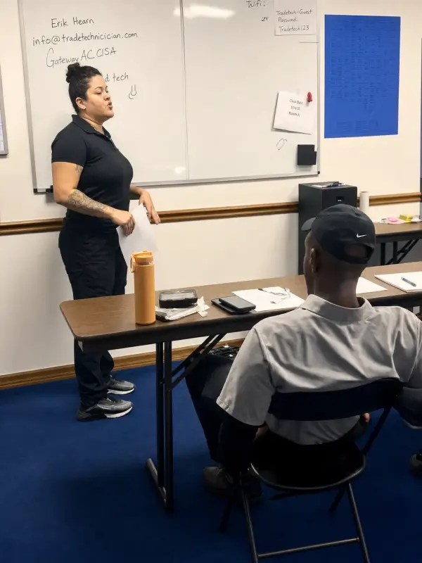 Smart Home Air and Heat team leader teaching HVAC technicians in Orlando classroom
